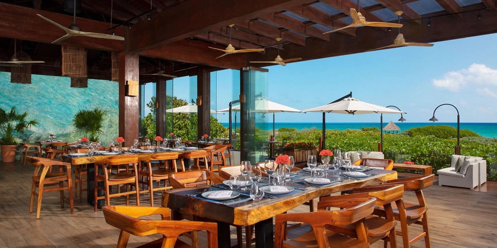 Oceana Restaurant oceanview dining terrace setup for wedding receptions at Secrets Playa Mujeres