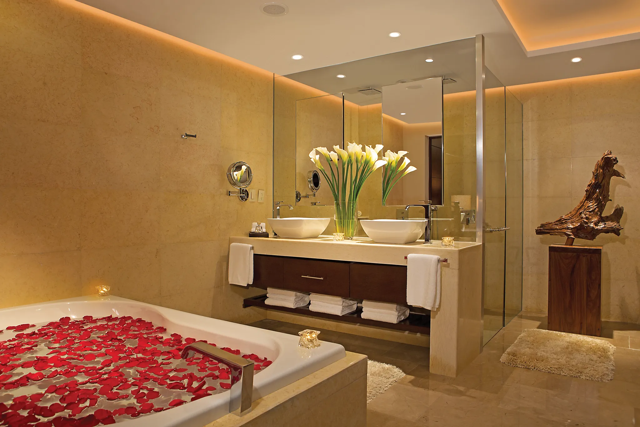 Preferred Club Master Suite Ocean Front bathroom with soaking tub, double vanity, and rain shower at Secrets Playa Mujeres Golf & Spa Resort.