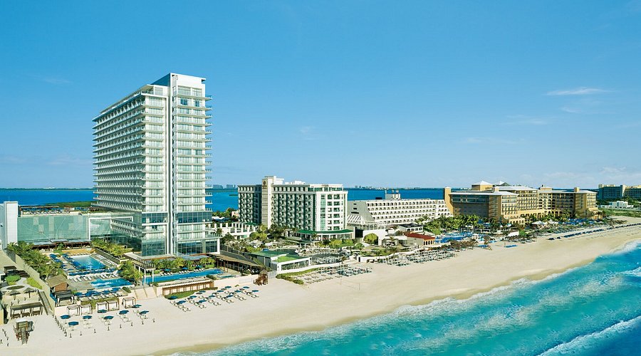 Secrets The Vine Cancun adults-only all-inclusive resort in Cancun Hotel Zone with sleek modern design, rooftop pool, and oceanfront location.