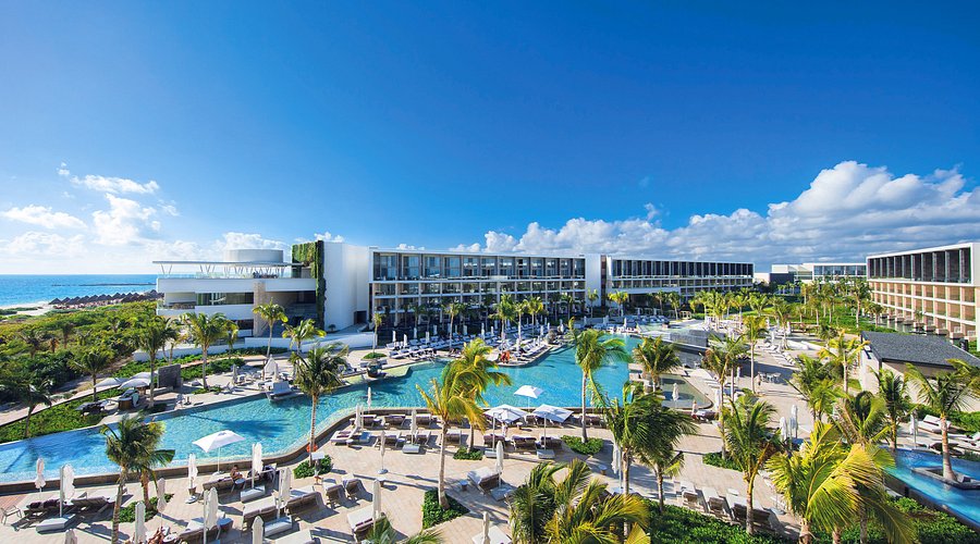 TRS Coral Hotel adults-only all-inclusive resort in Costa Mujeres with infinity pools, luxury suites, and premium Infinite Indulgence service.